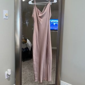 Blush color, satin dress with slit on the side. Adjustable straps